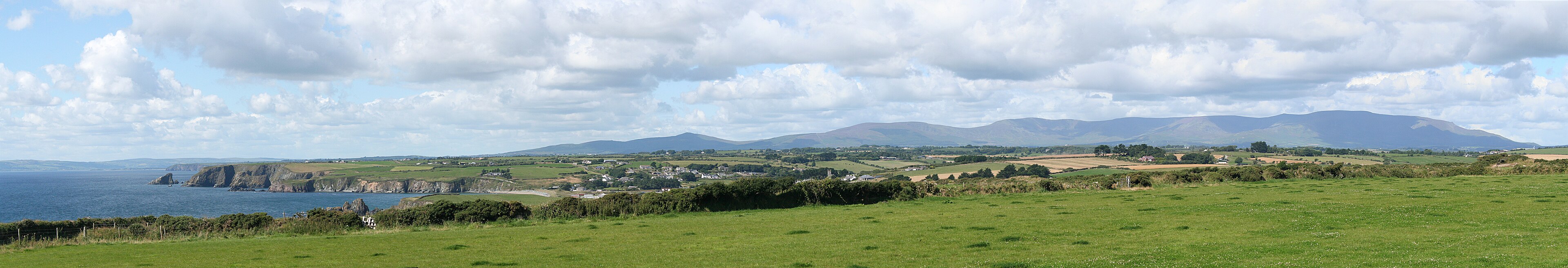 Panorama of the Copper Coast cliffs and coves in County Waterford